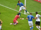 Italian midfielder Andrea Pirlo (back) stops the ball infront of the nets of Italian goalkeeper Gianluigi Buffon (C) during the Euro 2012 football championships semi-final match Germany vs Italy on June 28, 2012 at the National Stadium in Warsaw.  AFP PHOTO / GABRIEL BOUYS        (Photo credit should read GABRIEL BOUYS/AFP/GettyImages)